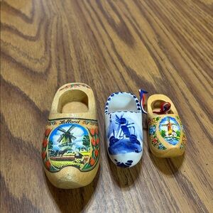 Two Wooden Clogs w/Blue & Tan Design and blue & white ceramic clog from Holland